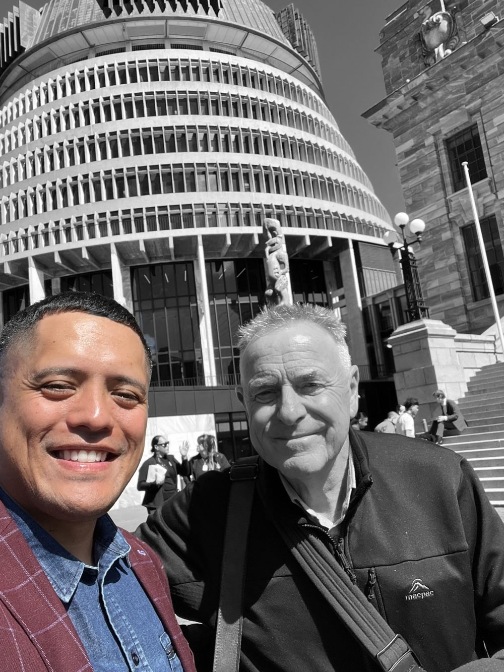 Tyrone in a selfie with a colleague outside the Beehive in Wellington